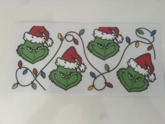 Grinch in Christmas lights wrap